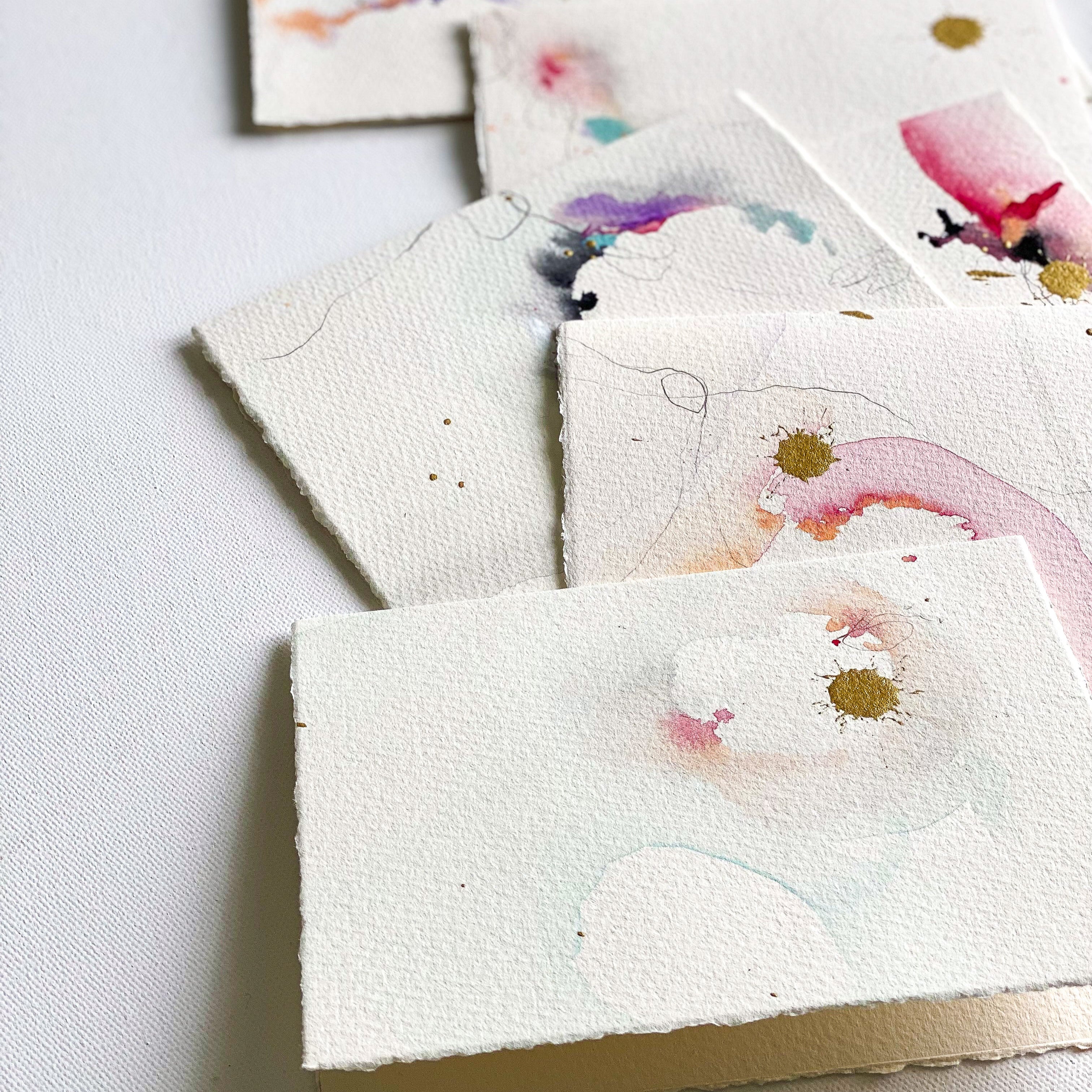Stationery with floral designs on a white surface