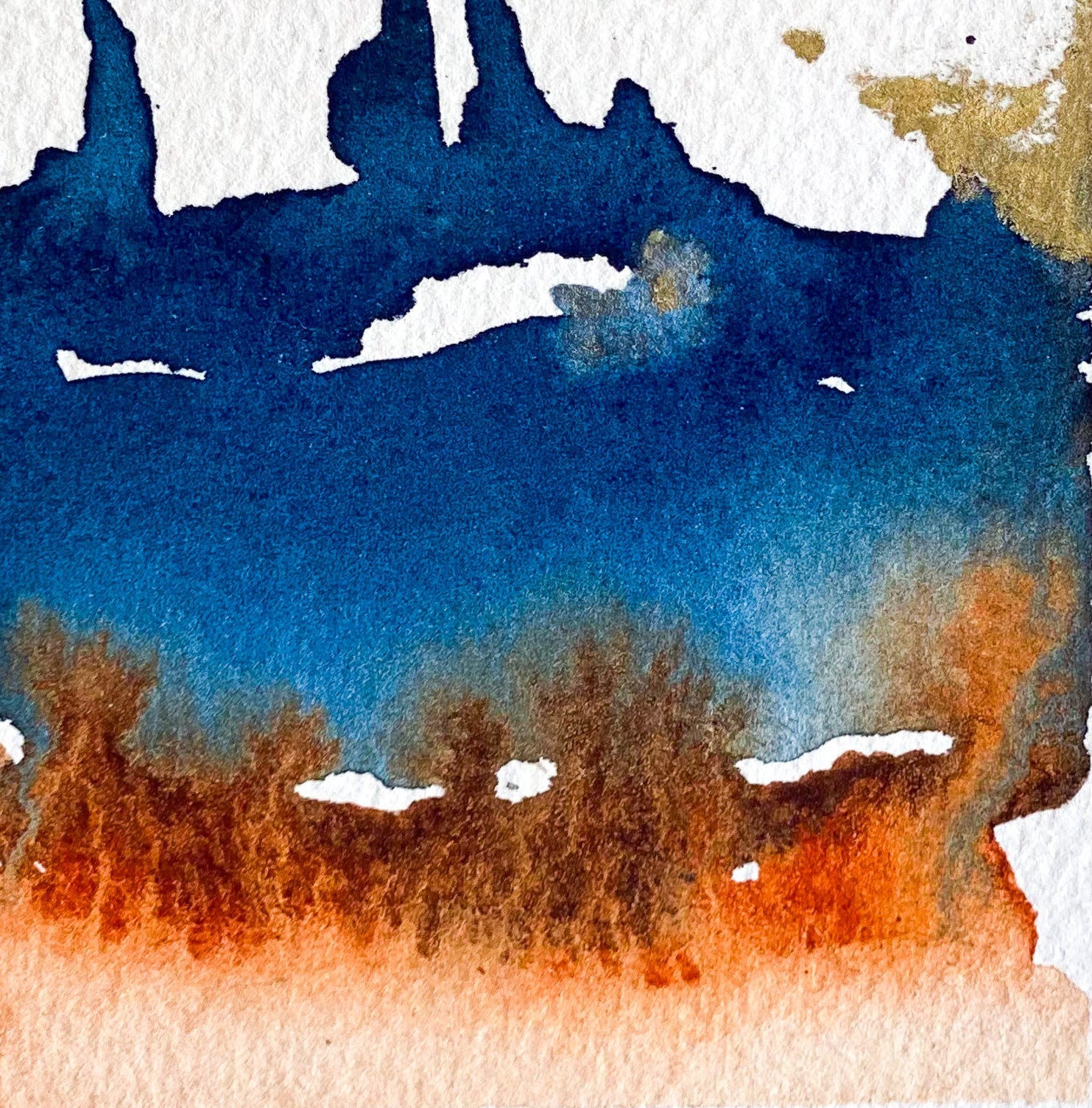 Abstract watercolor painting with blue, orange, and black on a white background