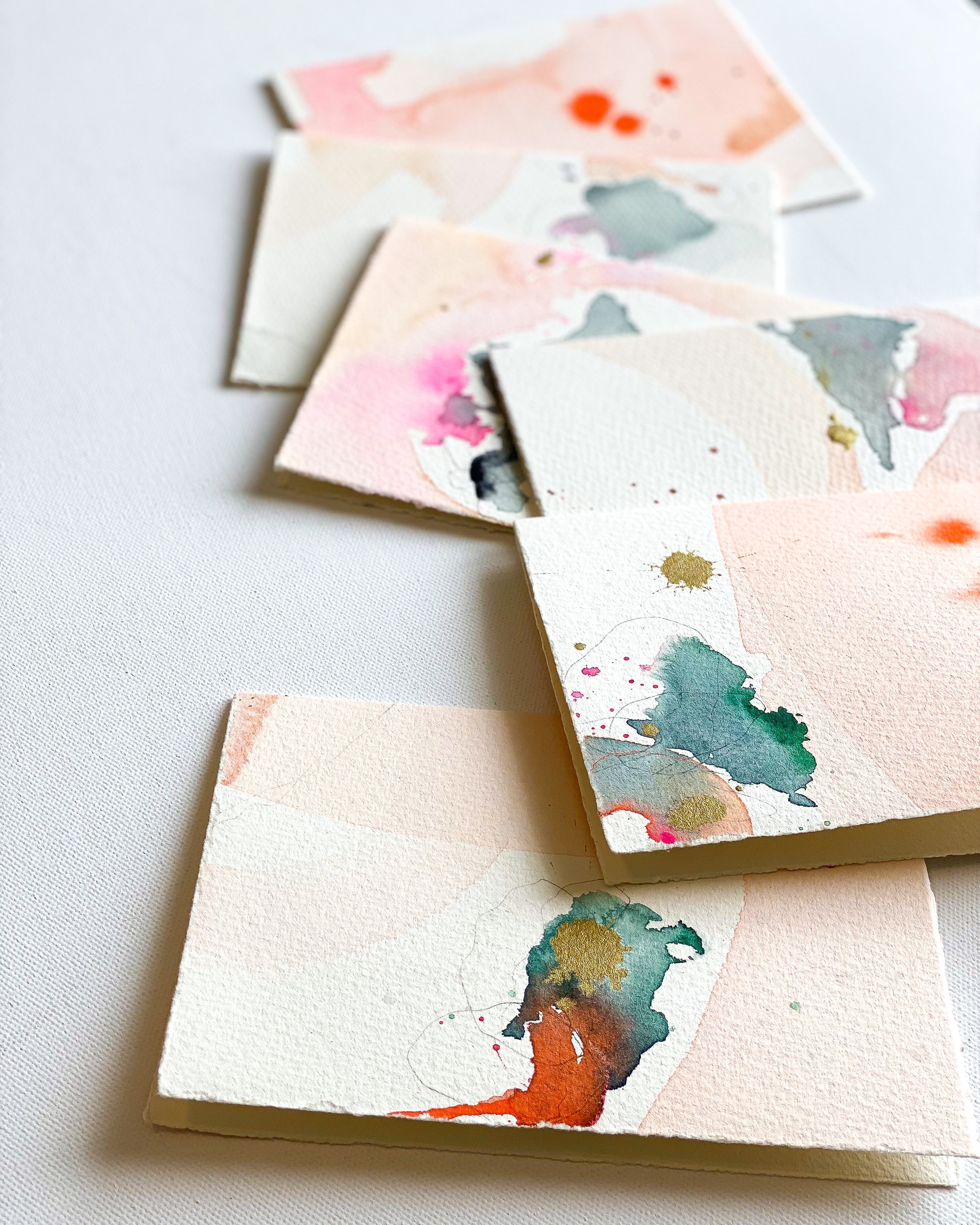 Set of watercolor cards on a light background